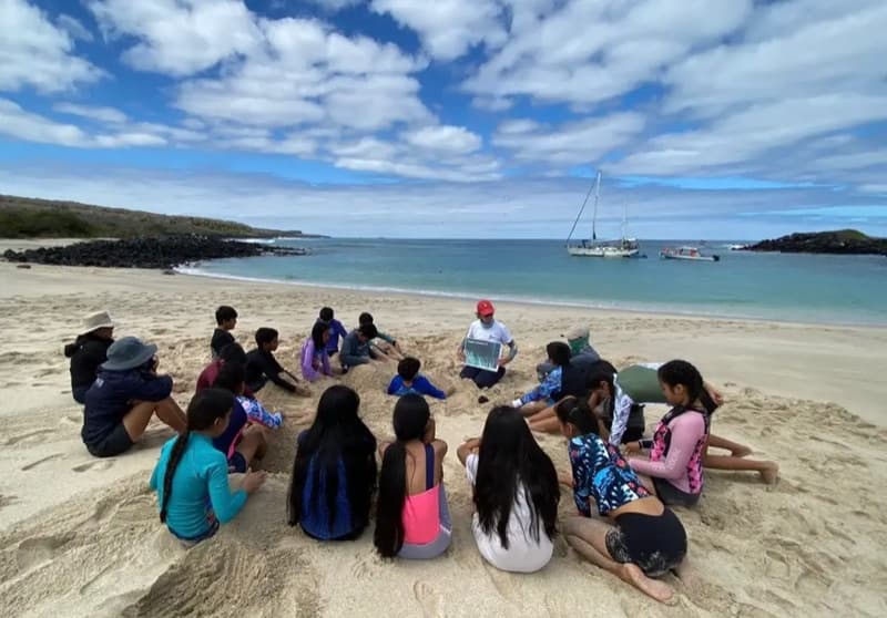 Community gathering on a coastal shore