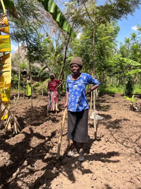 Community members planting seedlings